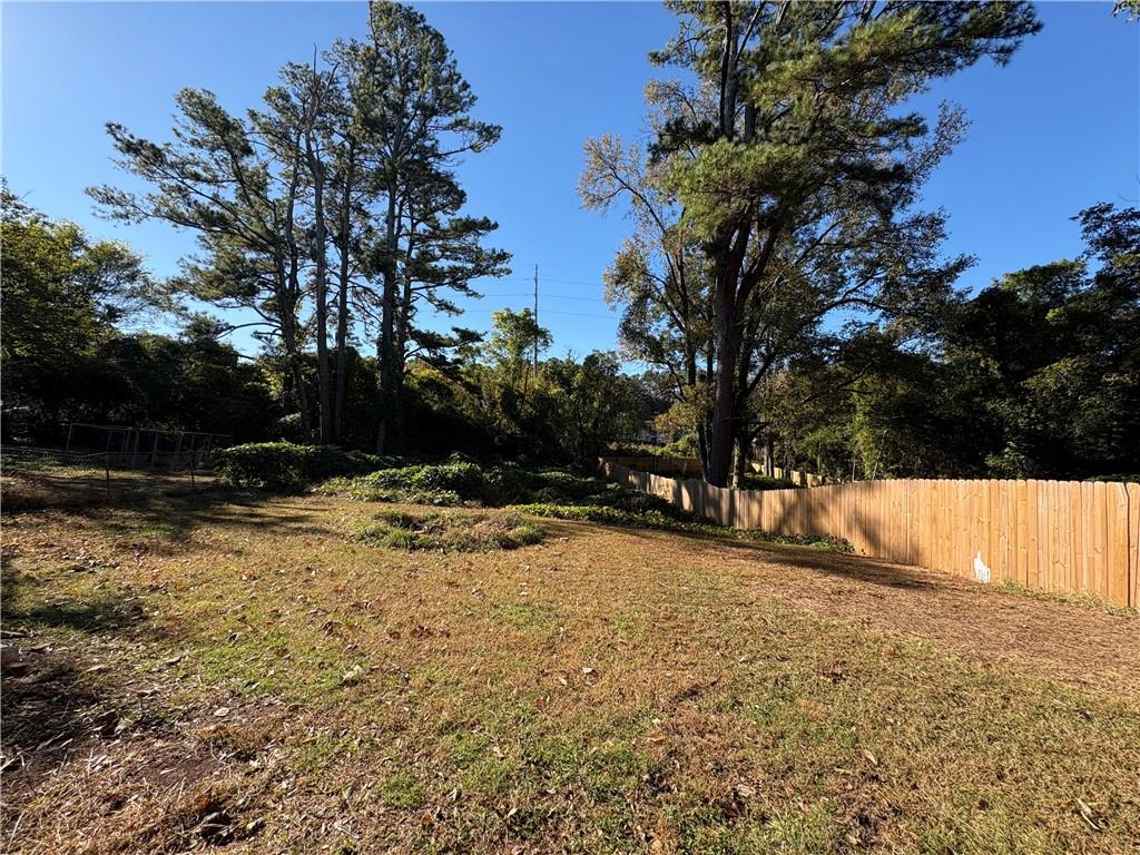267 East Broad Street Newnan, GA 30263 - Photo 13 of 15 a view of yard covered with snow in outdoor space