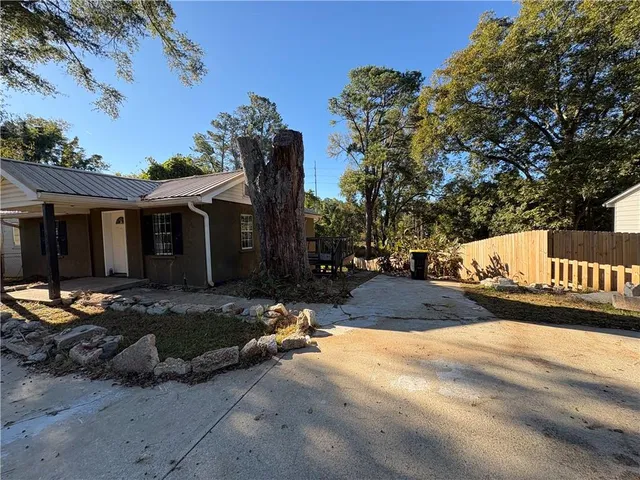a view of a street with some trees