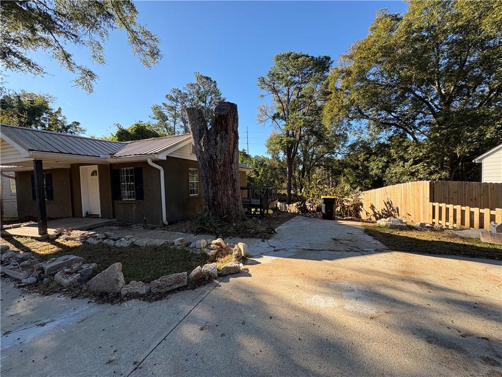 267 East Broad Street Newnan, GA 30263 - Photo 14 of 15 a view of a street with some trees