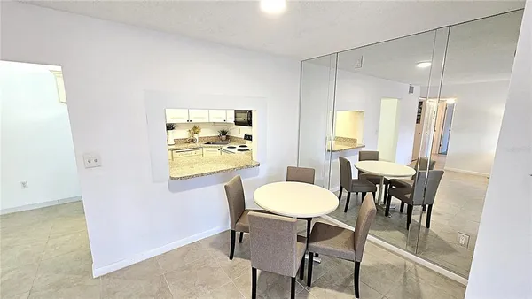 a view of a dining room with furniture