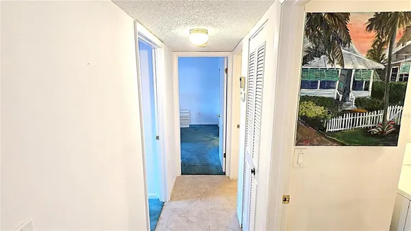 a view of a bathroom with a tub and shower