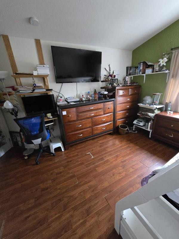 8930 West Flagler Street, Unit 221 Miami, FL 33174 - Photo 14 of 16 a room with furniture and a flat screen tv