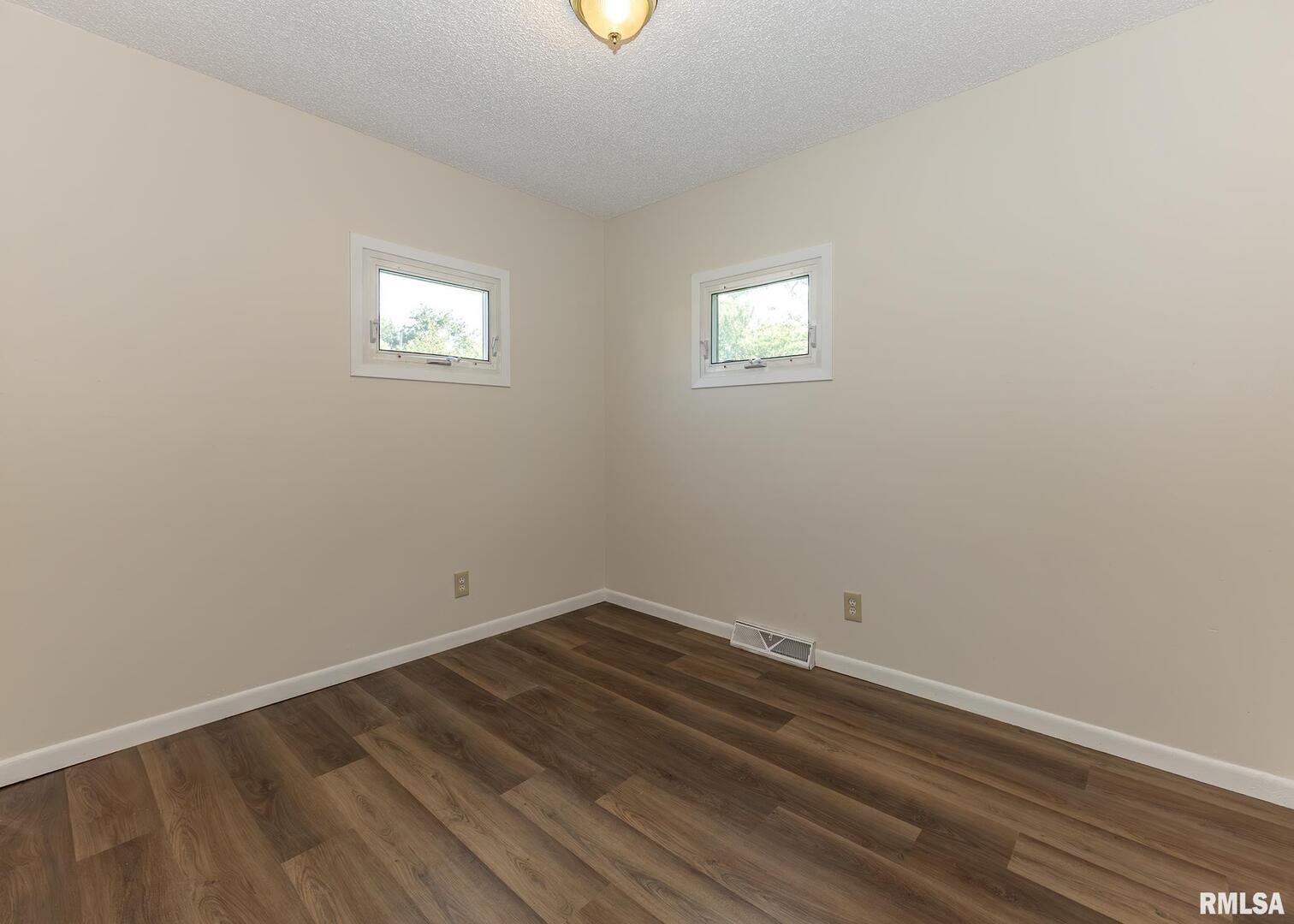 1529 North 8th Street Clinton, IA 52732 - Photo 9 of 15 wooden floor in a room