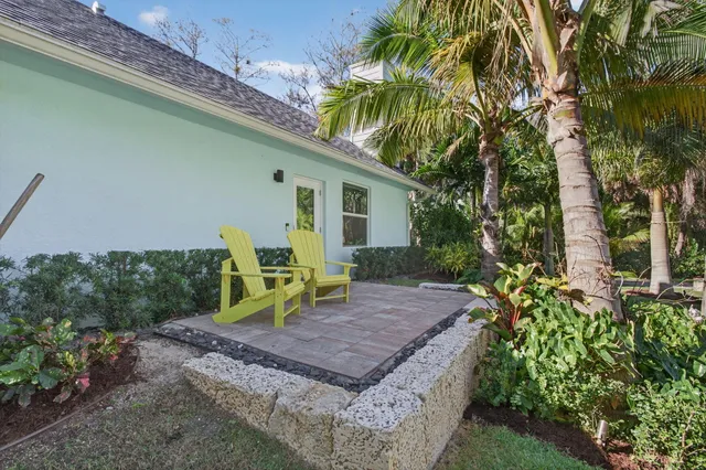 a view of a backyard with a patio