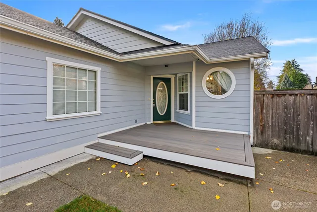 a view of a house with a small yard