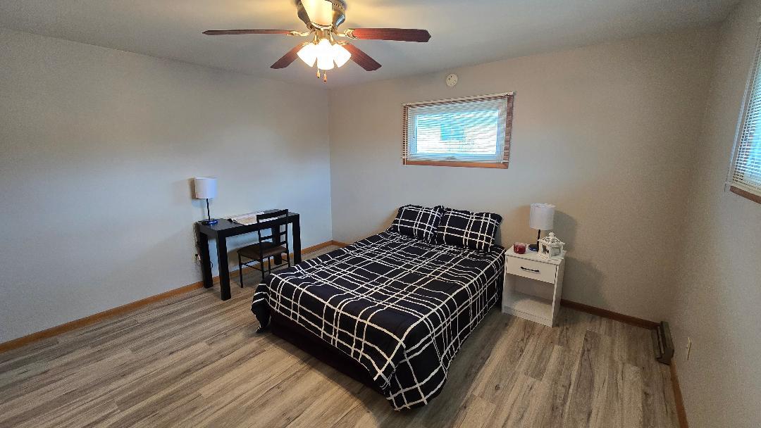 1124 13th Avenue Fulton, IL 61252 - Photo 17 of 27 a bedroom with bunk bed and a window