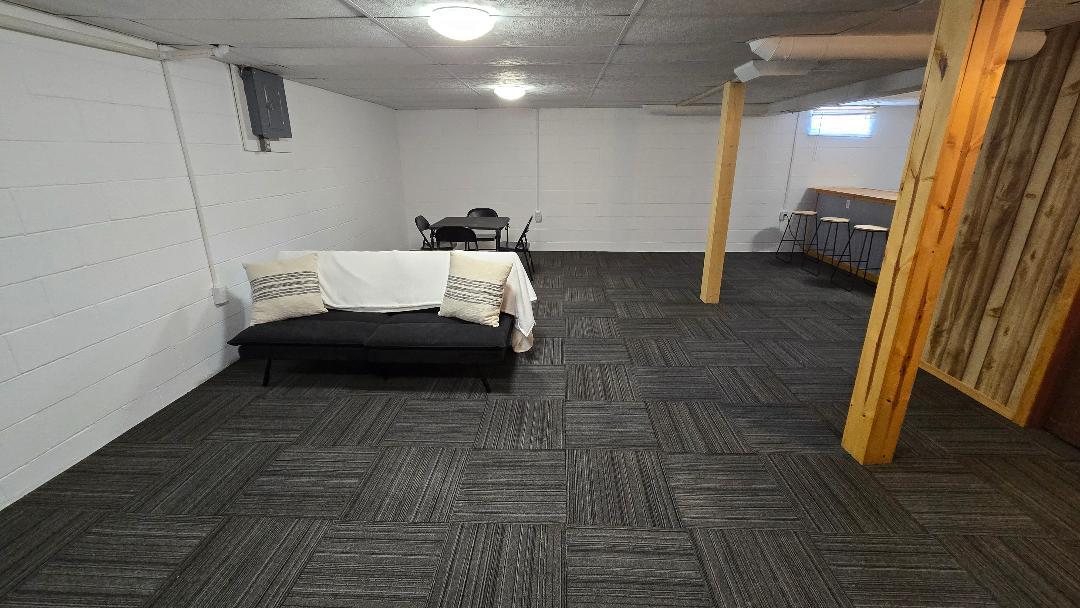 1124 13th Avenue Fulton, IL 61252 - Photo 23 of 27 a bathroom with a sink and mirror