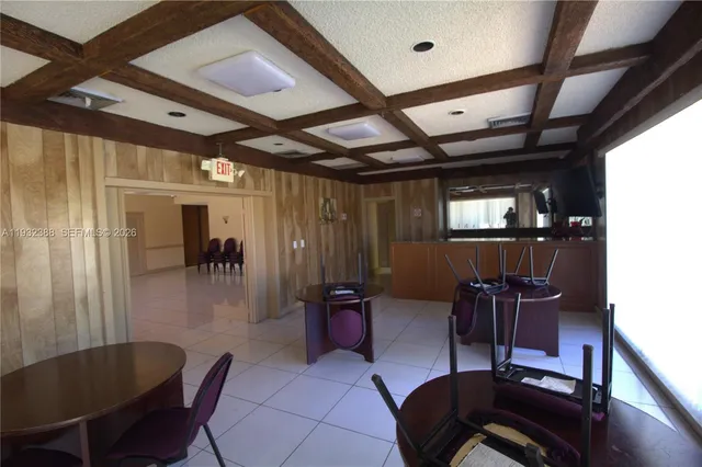 a livingroom with furniture and dining area