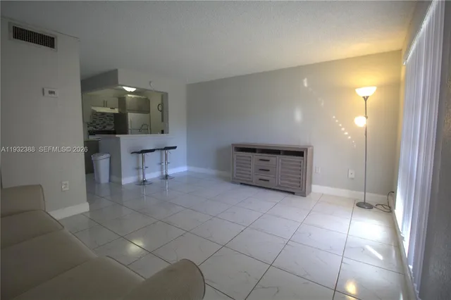 a view of kitchen and utility room
