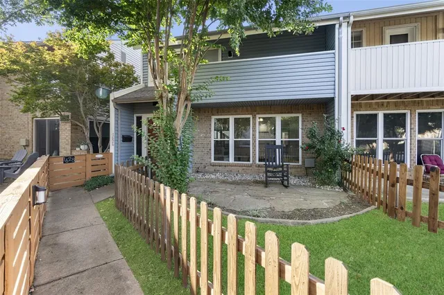 a front view of a house with a porch