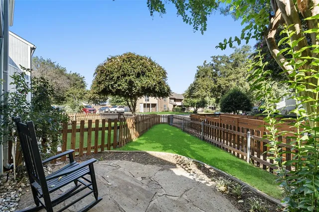 a garden view with a seating space