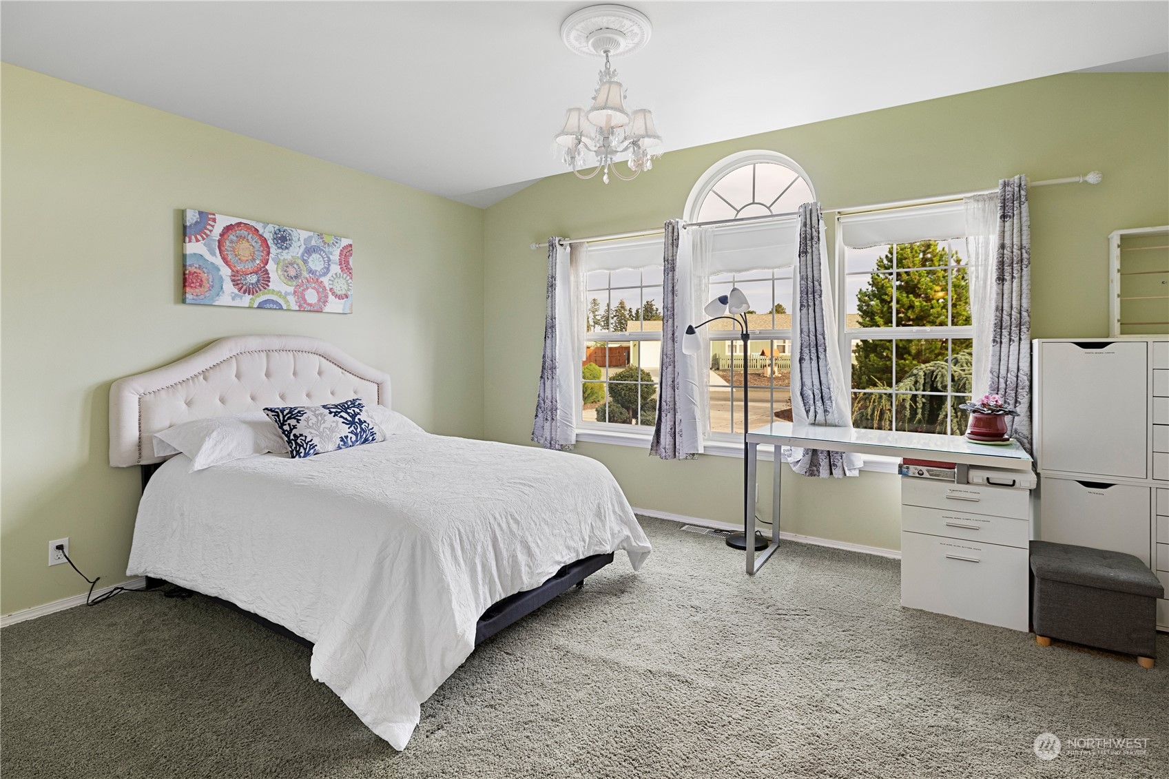 261 Chiesa Place Sequim, WA 98382 - Photo 19 of 39 a bedroom with a bed and a large window