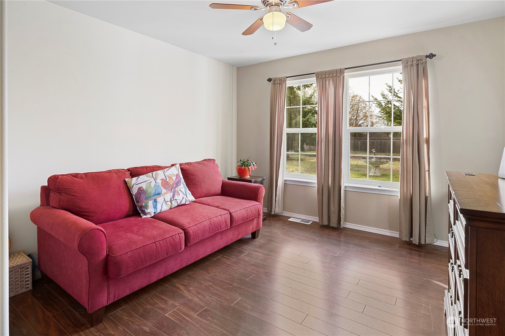 261 Chiesa Place Sequim, WA 98382 - Photo 20 of 39 a living room with furniture and a window