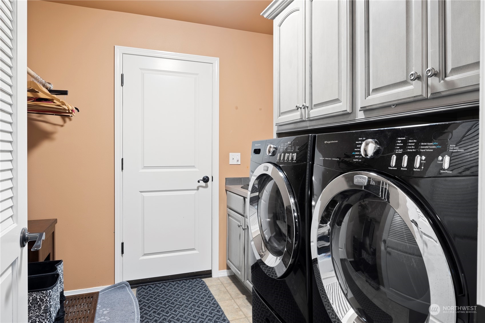 261 Chiesa Place Sequim, WA 98382 - Photo 23 of 39 a utility room with dryer and washer