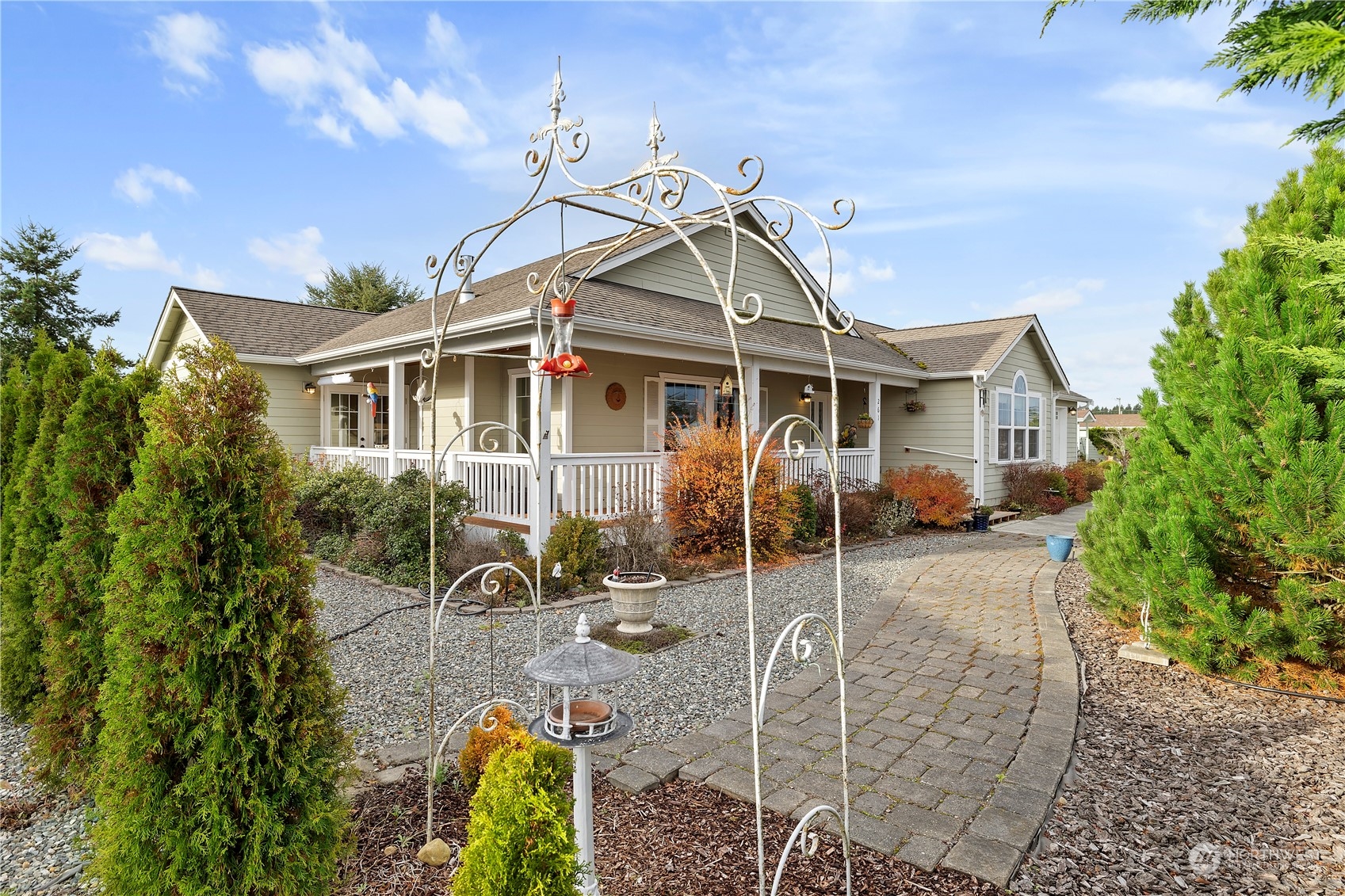 261 Chiesa Place Sequim, WA 98382 - Photo 27 of 39 front view of a house with a patio