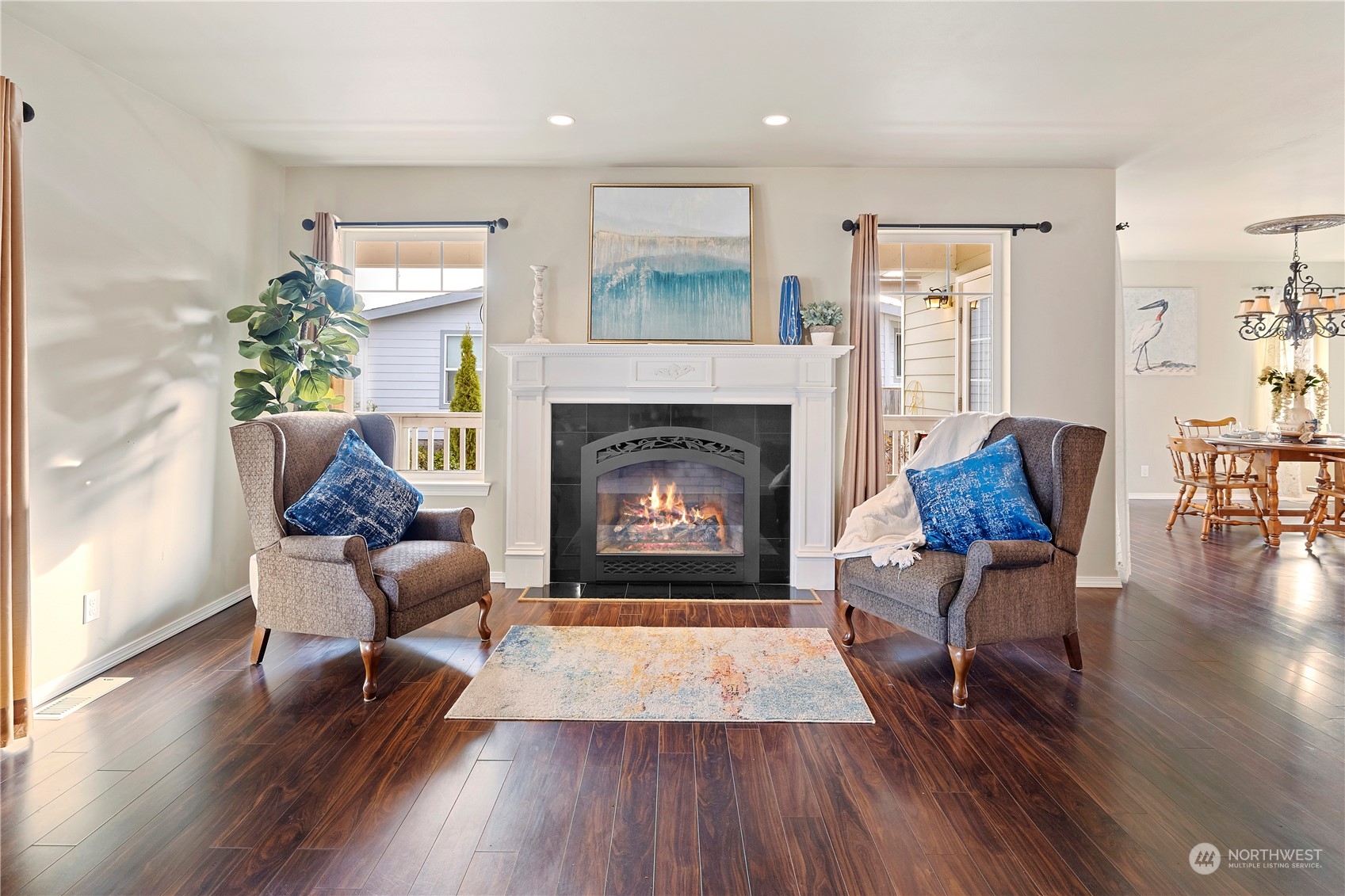 261 Chiesa Place Sequim, WA 98382 - Photo 3 of 39 a living room with furniture and a fireplace