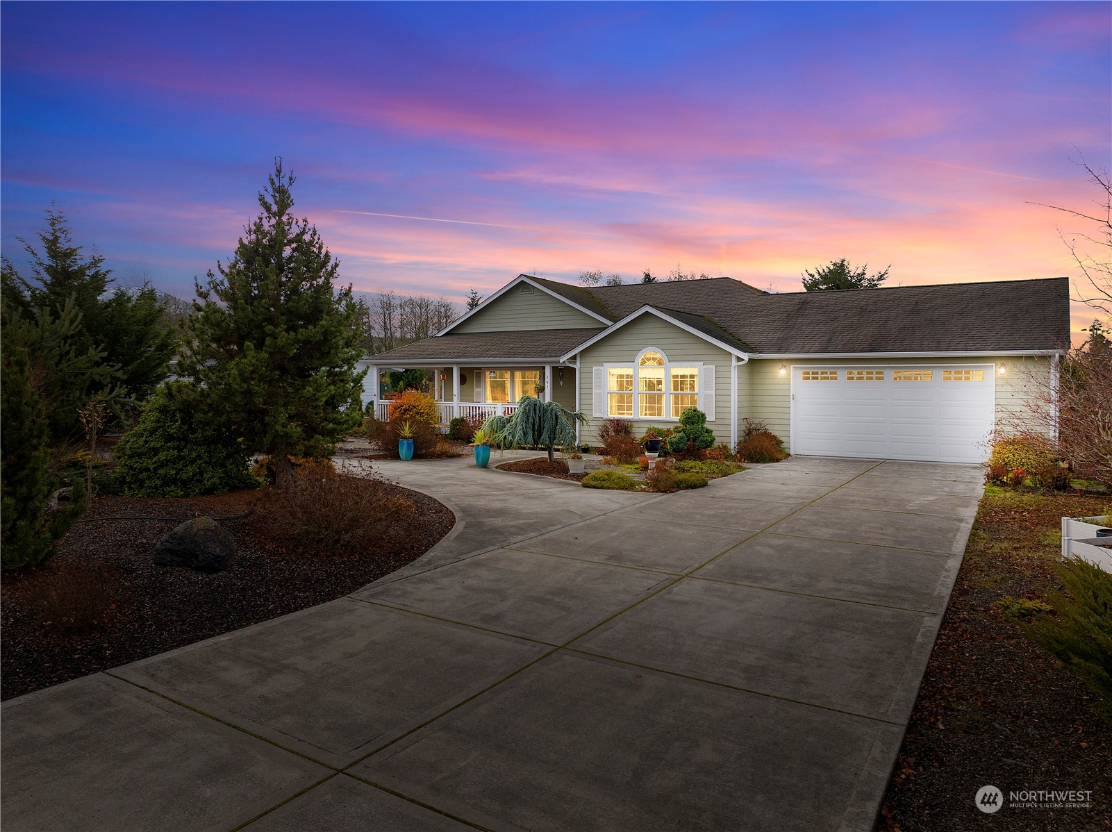 261 Chiesa Place Sequim, WA 98382 - Photo 39 of 39 a front view of a house with garden