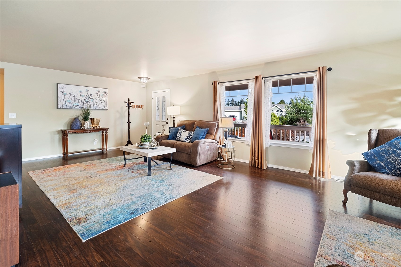 261 Chiesa Place Sequim, WA 98382 - Photo 7 of 39 a living room with furniture and wooden floor