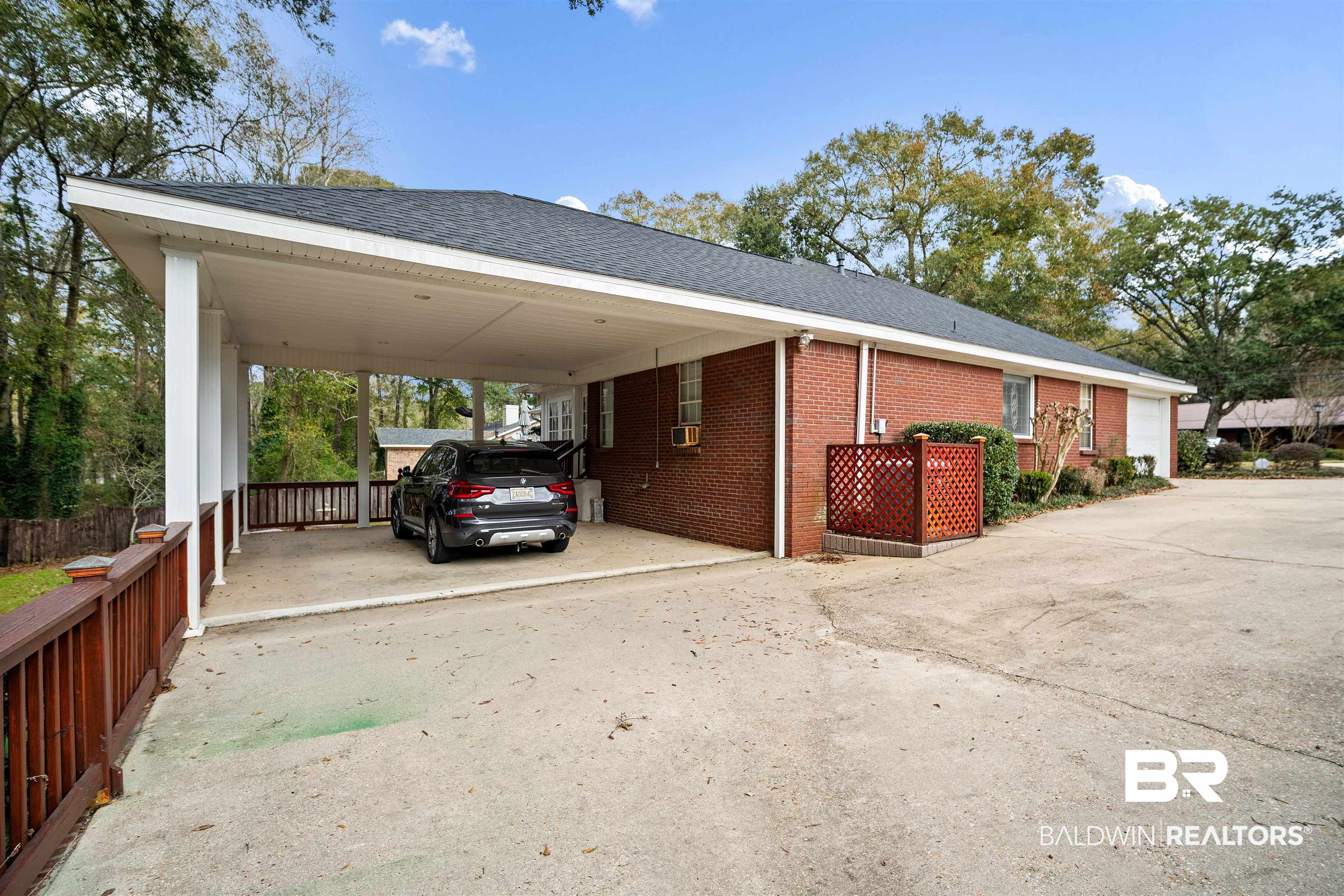 1744 Aden Road Mobile, AL 36695 - Photo 35 of 35 View of parking with a carport