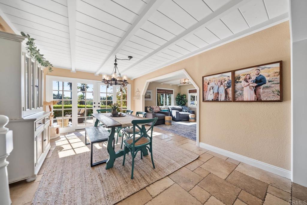 1569 Vía Monserate Fallbrook, CA 92028 - Photo 17 of 75 a view of a dining room with furniture window and outside view