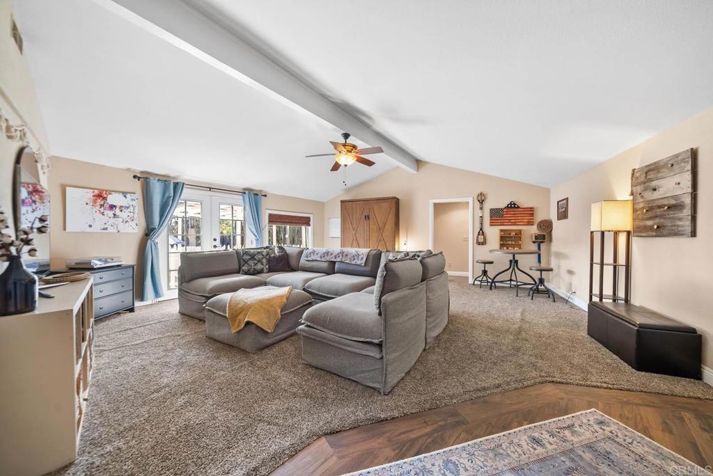 1569 Vía Monserate Fallbrook, CA 92028 - Photo 20 of 75 a living room with furniture and a flat screen tv