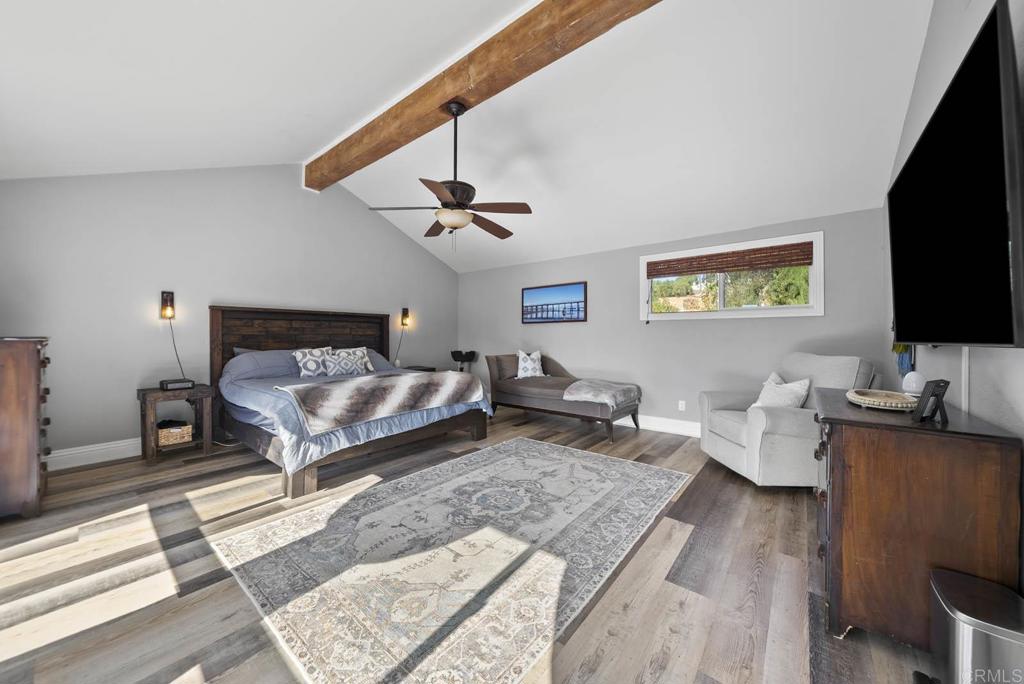 1569 Vía Monserate Fallbrook, CA 92028 - Photo 26 of 75 a living room with furniture and a flat screen tv