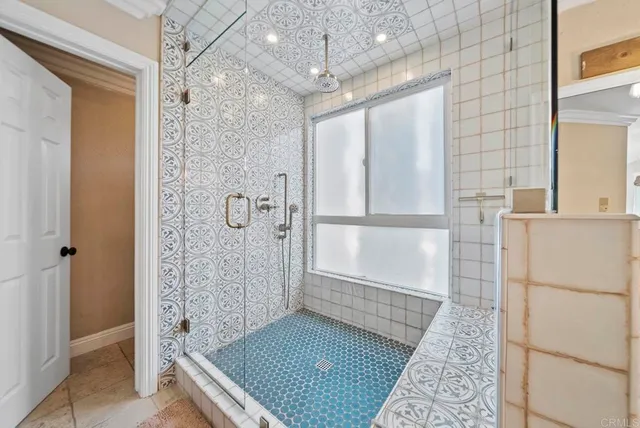 a bathroom with a sink mirror toilet and bathtub