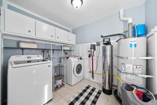 a view of a swimming pool and trees in the background