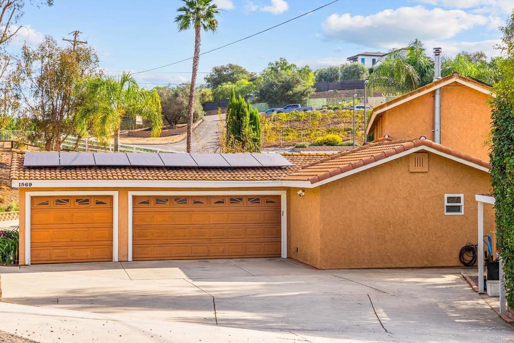 1569 Vía Monserate Fallbrook, CA 92028 - Photo 44 of 75 a view of a house with a garage
