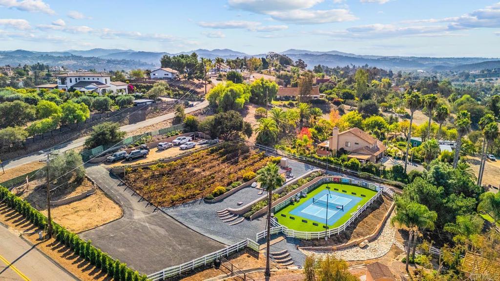 1569 Vía Monserate Fallbrook, CA 92028 - Photo 49 of 75 an aerial view of a residential houses with outdoor space and swimming pool