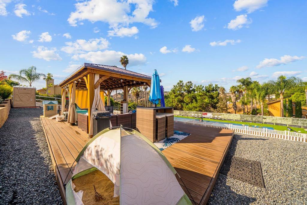 1569 Vía Monserate Fallbrook, CA 92028 - Photo 57 of 75 swimming pool with outdoor seating and city view