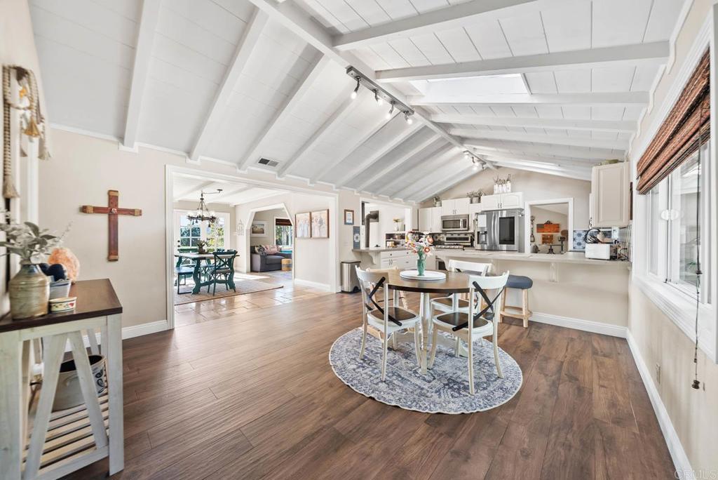 1569 Vía Monserate Fallbrook, CA 92028 - Photo 7 of 75 a living room with furniture and a wooden floor