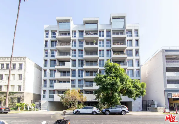 a front view of a building with street view