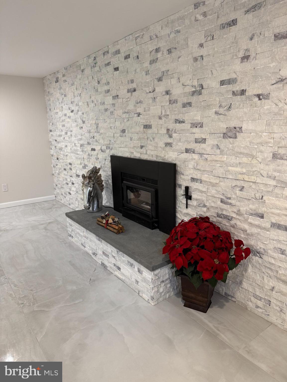 161 Pleasant Valley Road Titusville, NJ 08560 - Photo 17 of 63 a living room with a fireplace