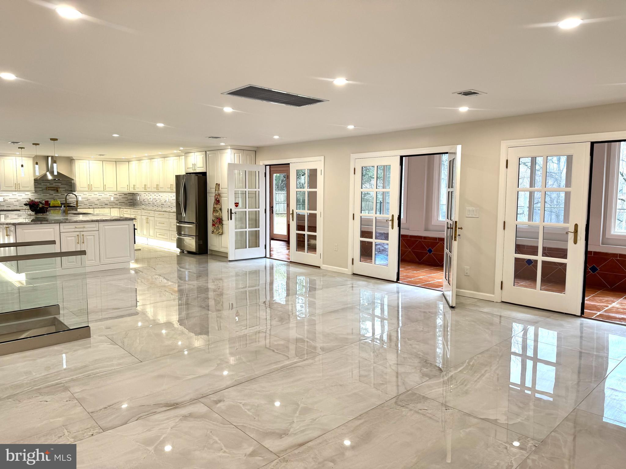 161 Pleasant Valley Road Titusville, NJ 08560 - Photo 3 of 63 a view of a living room kitchen with stainless steel appliances kitchen island granite countertop a large window and a counter top space