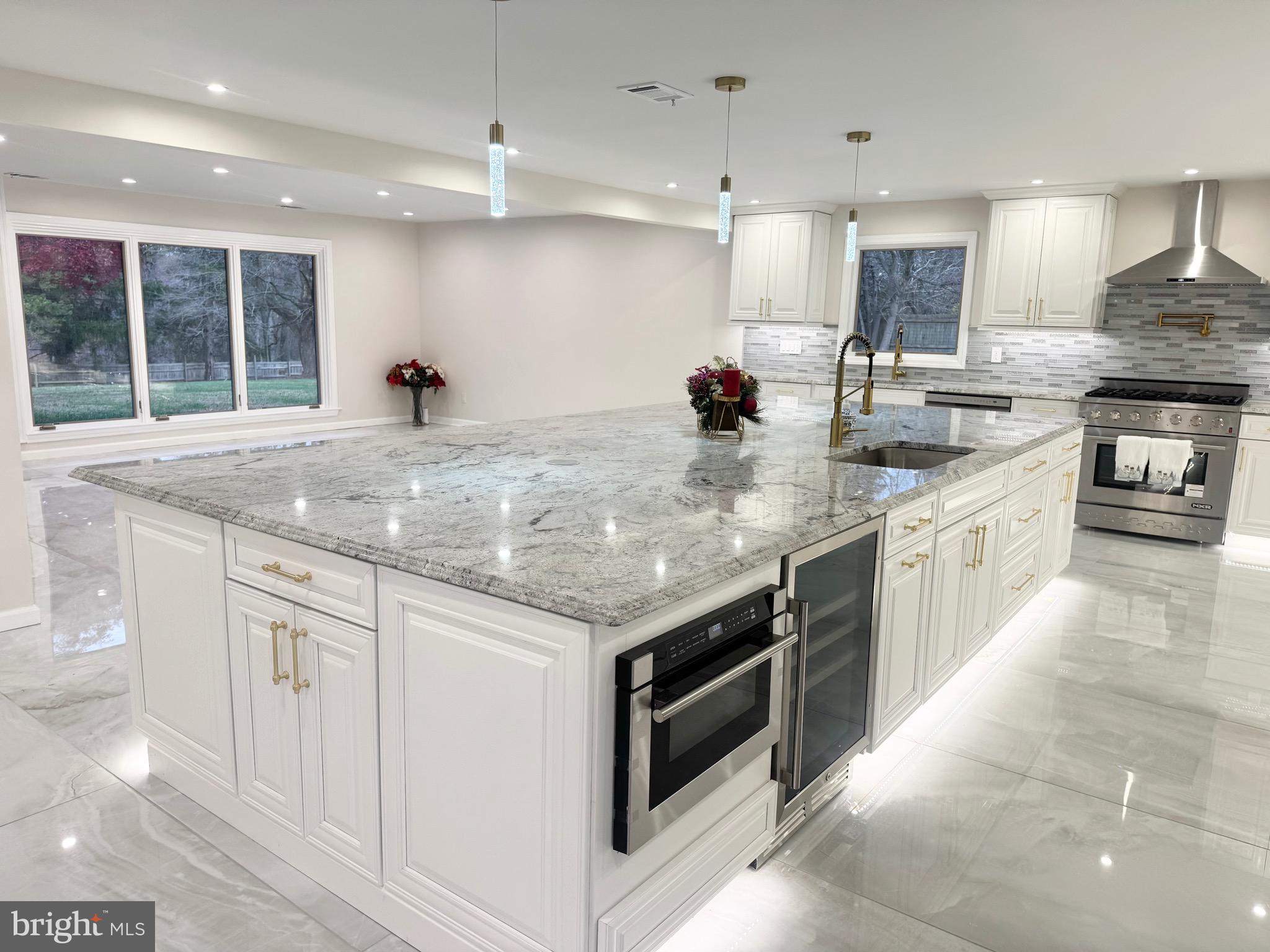 161 Pleasant Valley Road Titusville, NJ 08560 - Photo 4 of 63 a kitchen with stainless steel appliances granite countertop a stove and a sink