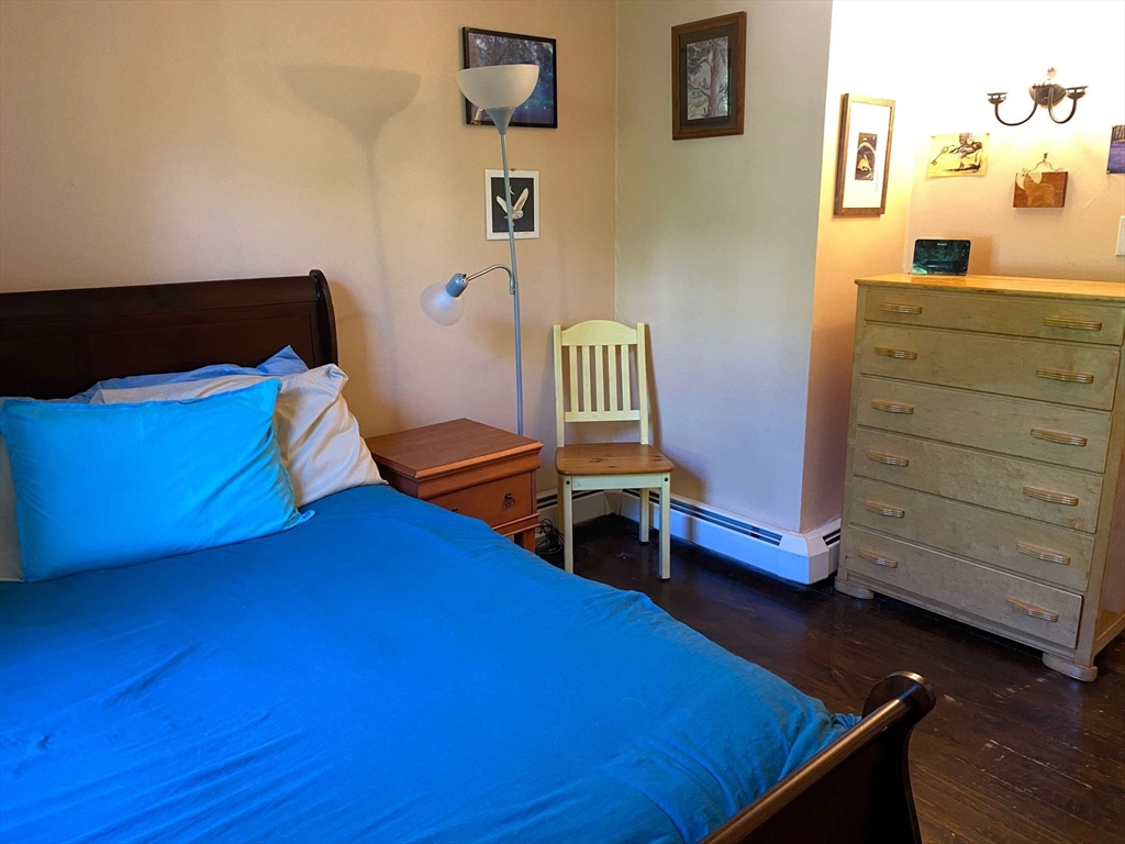 8 May Street Beverly, MA 01915 - Photo 15 of 25 a room with furniture and a wooden floor