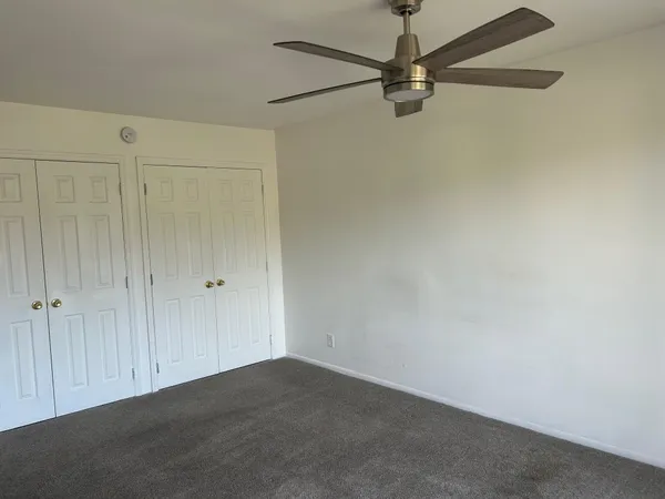 a view of a livingroom with a ceiling fan
