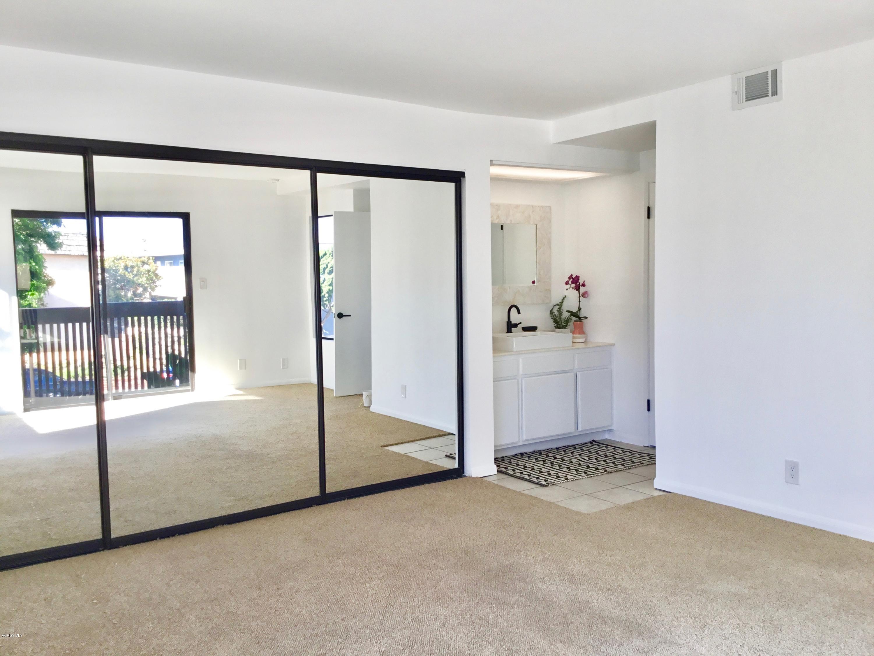 5205 West Wooley Road, Unit 1 Oxnard, CA 93035 - Photo 13 of 21 a view of an empty room with a window