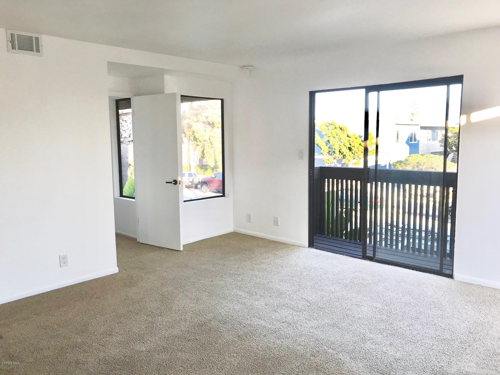 5205 West Wooley Road, Unit 1 Oxnard, CA 93035 - Photo 15 of 21 an empty room with windows