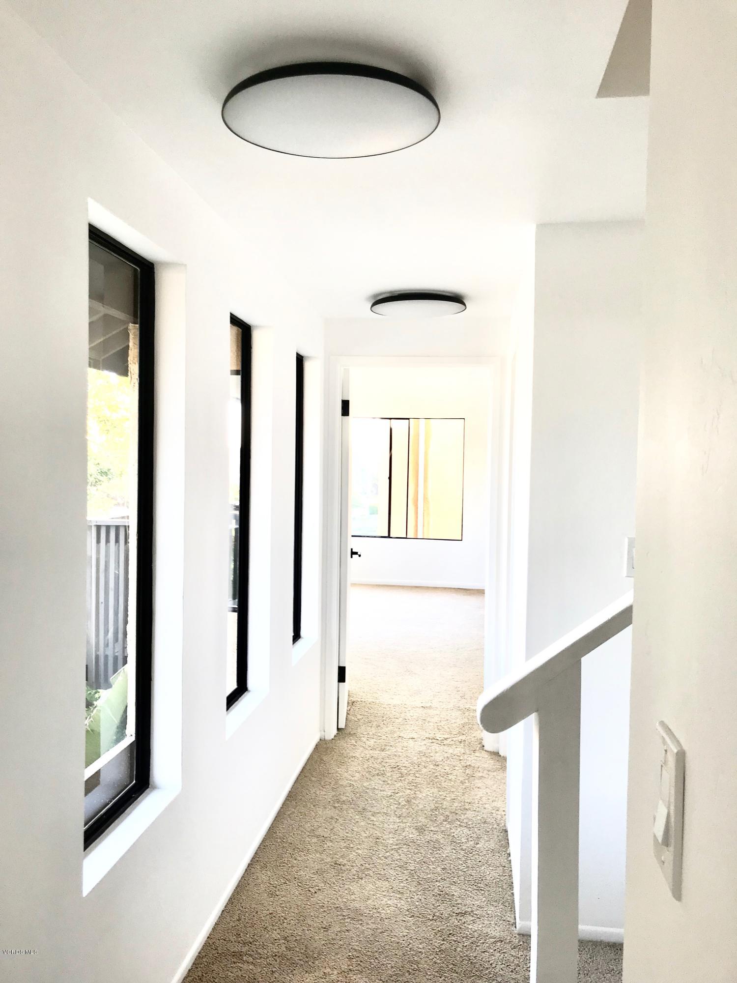 5205 West Wooley Road, Unit 1 Oxnard, CA 93035 - Photo 17 of 21 a view of entry way with wooden floor