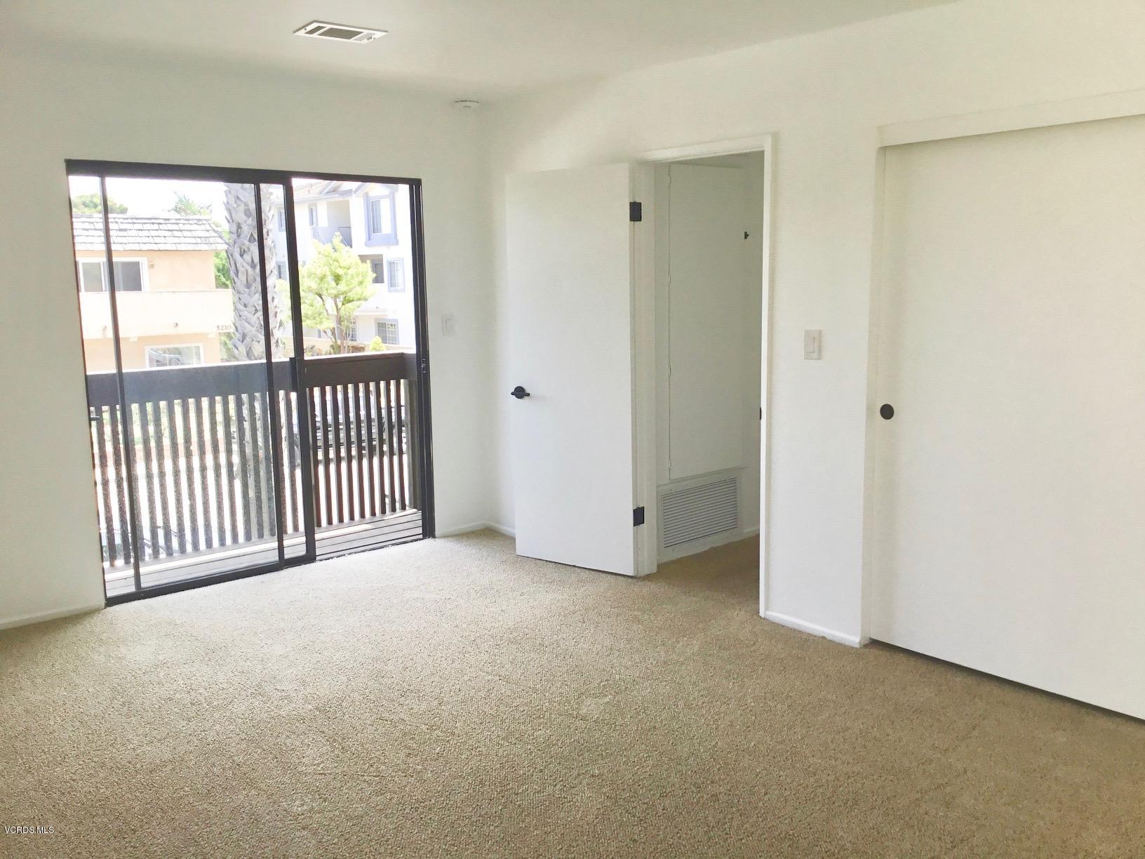 5205 West Wooley Road, Unit 1 Oxnard, CA 93035 - Photo 19 of 21 an empty room with windows