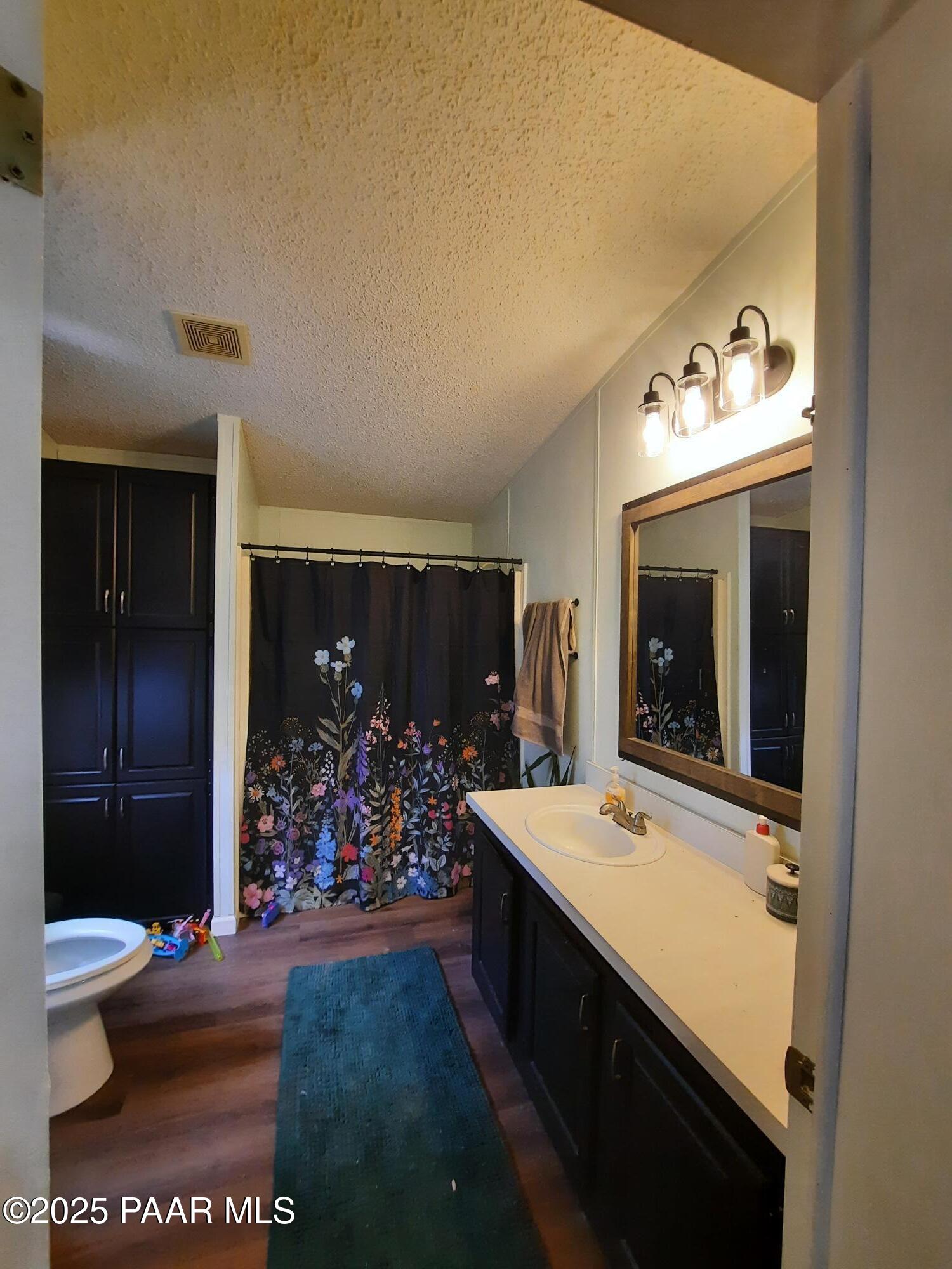 61333 Rough Rock Road Seligman, AZ 86337 - Photo 13 of 34 a view of bathroom with dual sinks