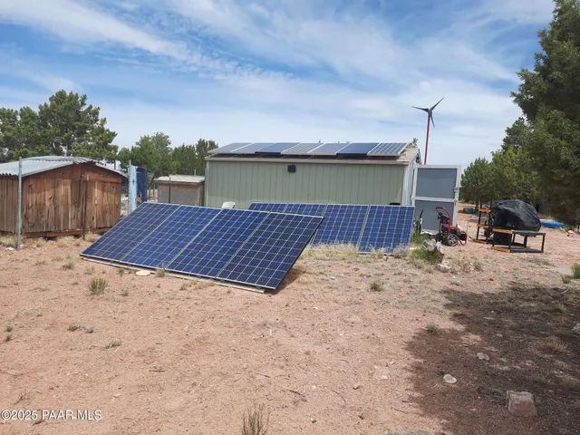 a view of backyard space and deck