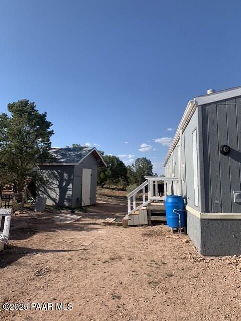 61333 Rough Rock Road Seligman, AZ 86337 - Photo 4 of 34 a view of a house with a snow in the background