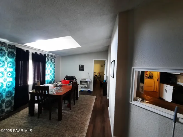 a living room with furniture and a windows