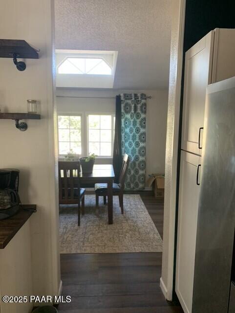 61333 Rough Rock Road Seligman, AZ 86337 - Photo 9 of 34 a view of a dining room with furniture and a window