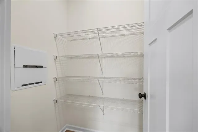 a view of a room with rack on the wall