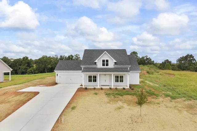 a view of a house with a swimming pool