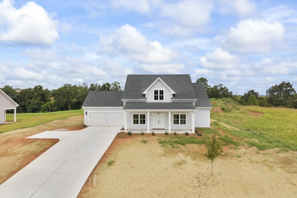 633 Racetrack Road Toccoa, GA 30577 - Photo 2 of 37 a view of a house with a swimming pool